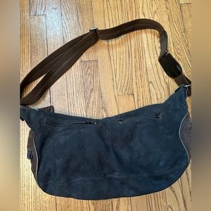 This is a crossbody jamin purch bag. It has been worn.